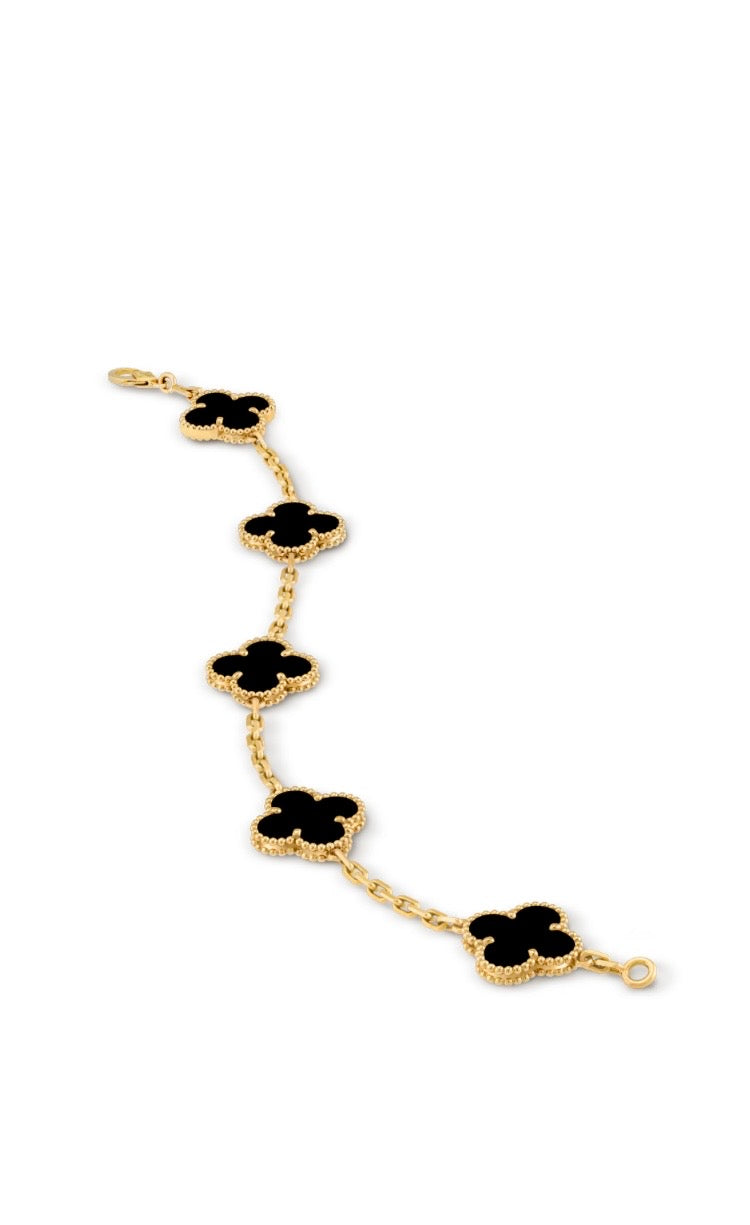 Vintage Alhambra bracelet, 5 motifs
18K rose gold, Onyx